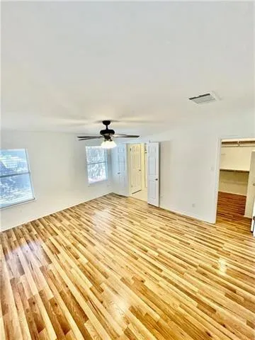 a view of a livingroom with wooden floor