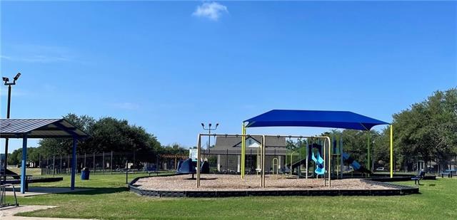 17312 Manish Drive Pflugerville, TX 78660 - Photo 18 of 19 a view of a building with a swimming pool and sitting area