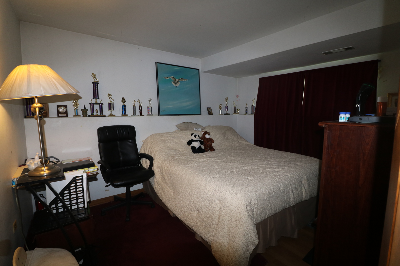 589 Redwood Road Bolingbrook, IL 60440 - Photo 12 of 18 a bedroom with a bed and a chair