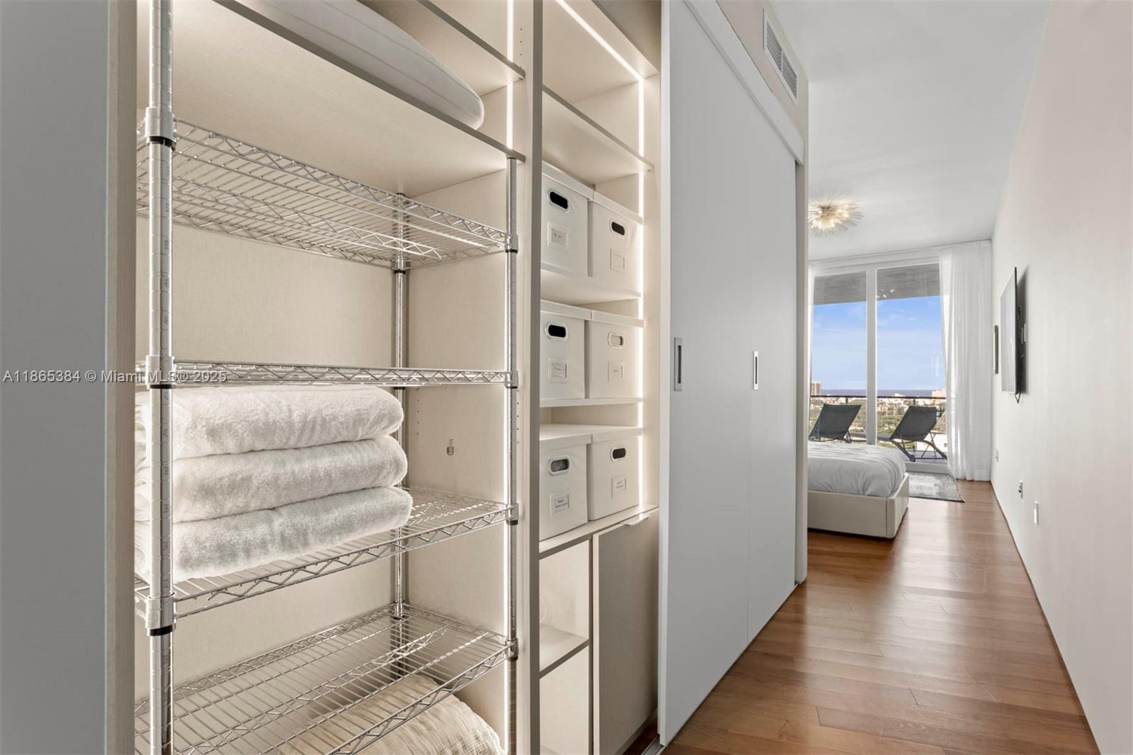 1300 Monad Terrace, Unit 11C Miami Beach, FL 33139 - Photo 18 of 29 a walk in closet and view of bathroom