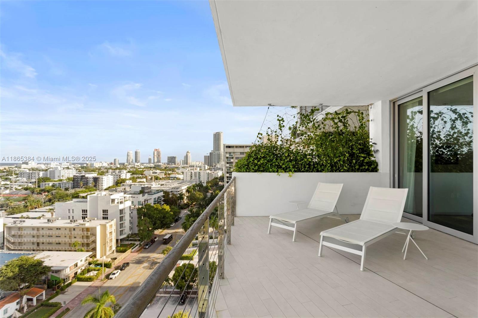 1300 Monad Terrace, Unit 11C Miami Beach, FL 33139 - Photo 19 of 29 a balcony with wooden floor and city view