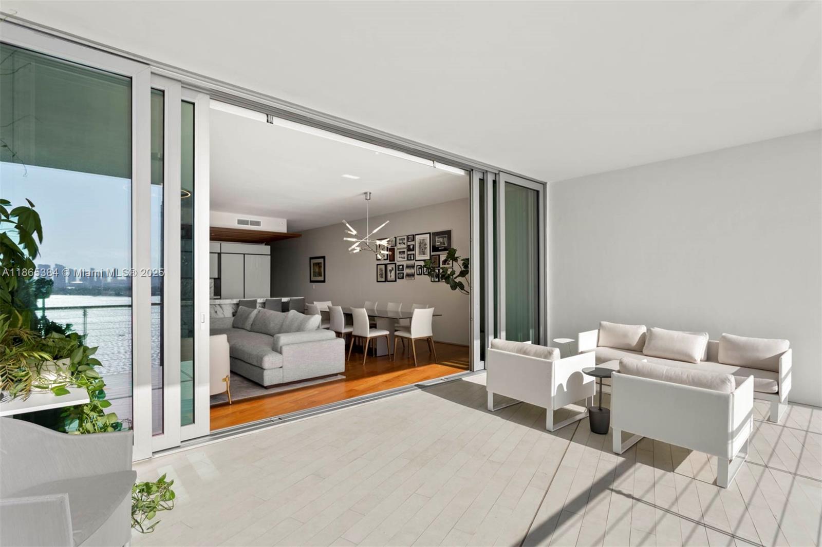 1300 Monad Terrace, Unit 11C Miami Beach, FL 33139 - Photo 25 of 29 a living room with furniture and a large window