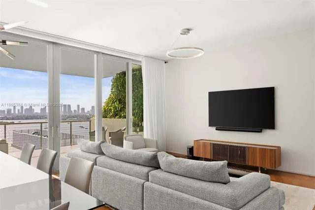 a view of swimming pool with outdoor seating