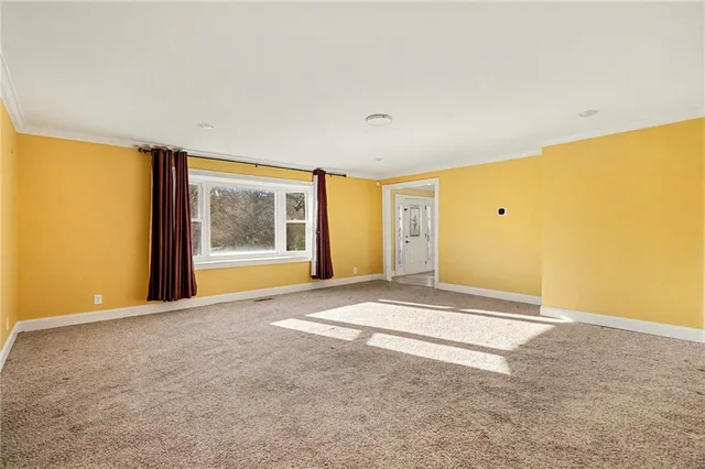 a view of an empty room with window