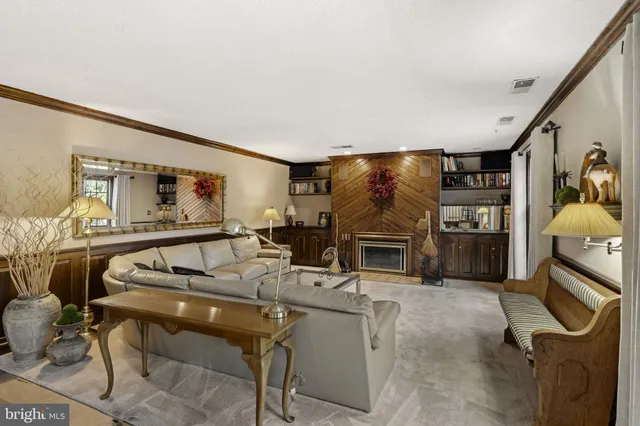 a spacious bedroom with a bed and a couch