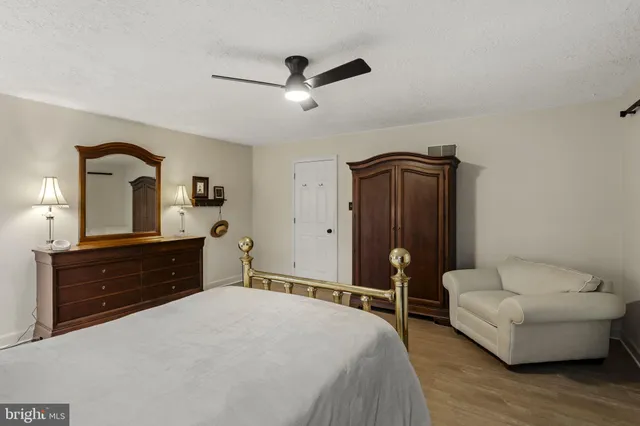 a bathroom with a shower and a toilet