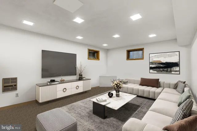 an aerial view of a house with backyard