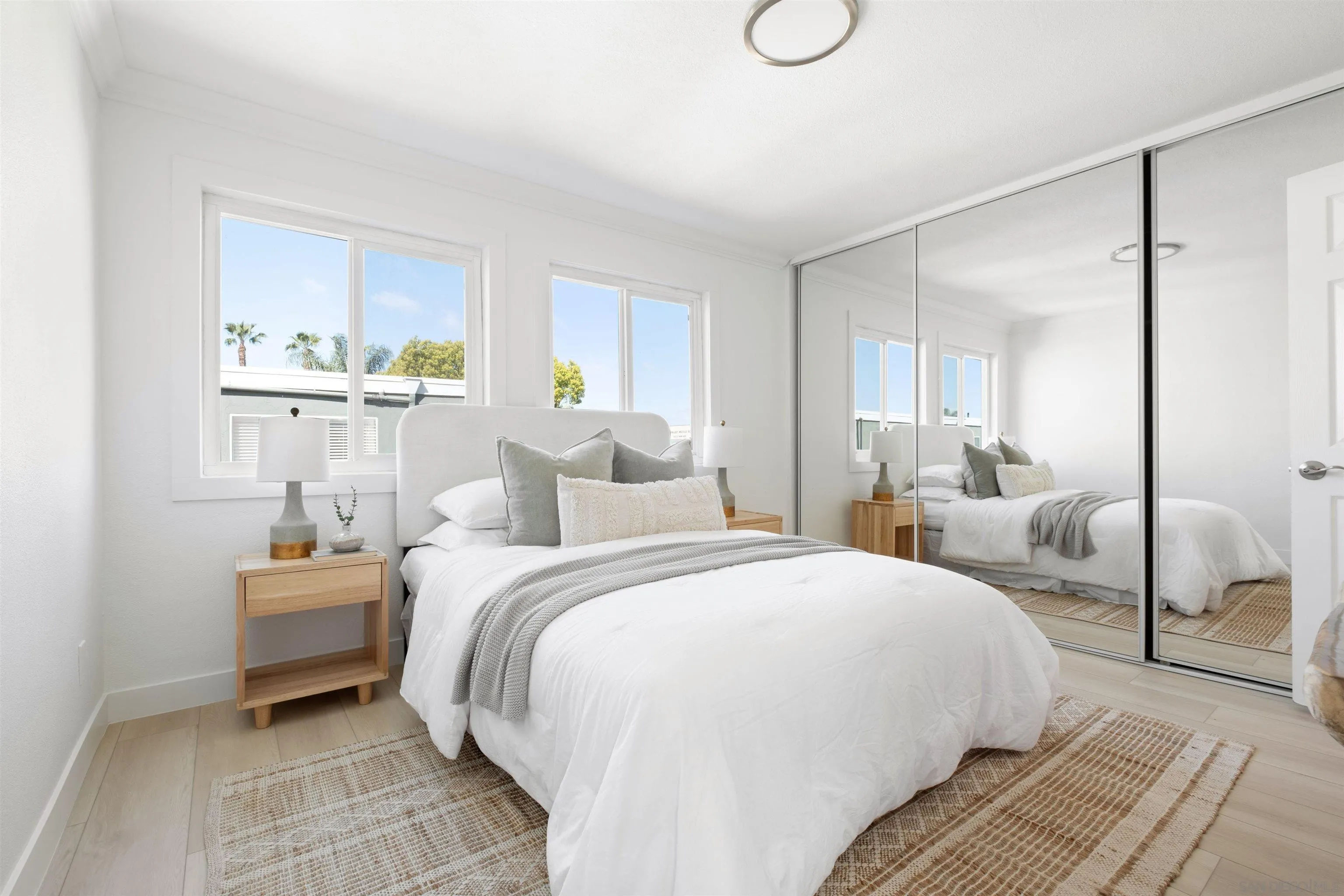 300 Roanoke Road, Unit 11 El Cajon, CA 92020 - Photo 14 of 28 a bedroom with a bed and window