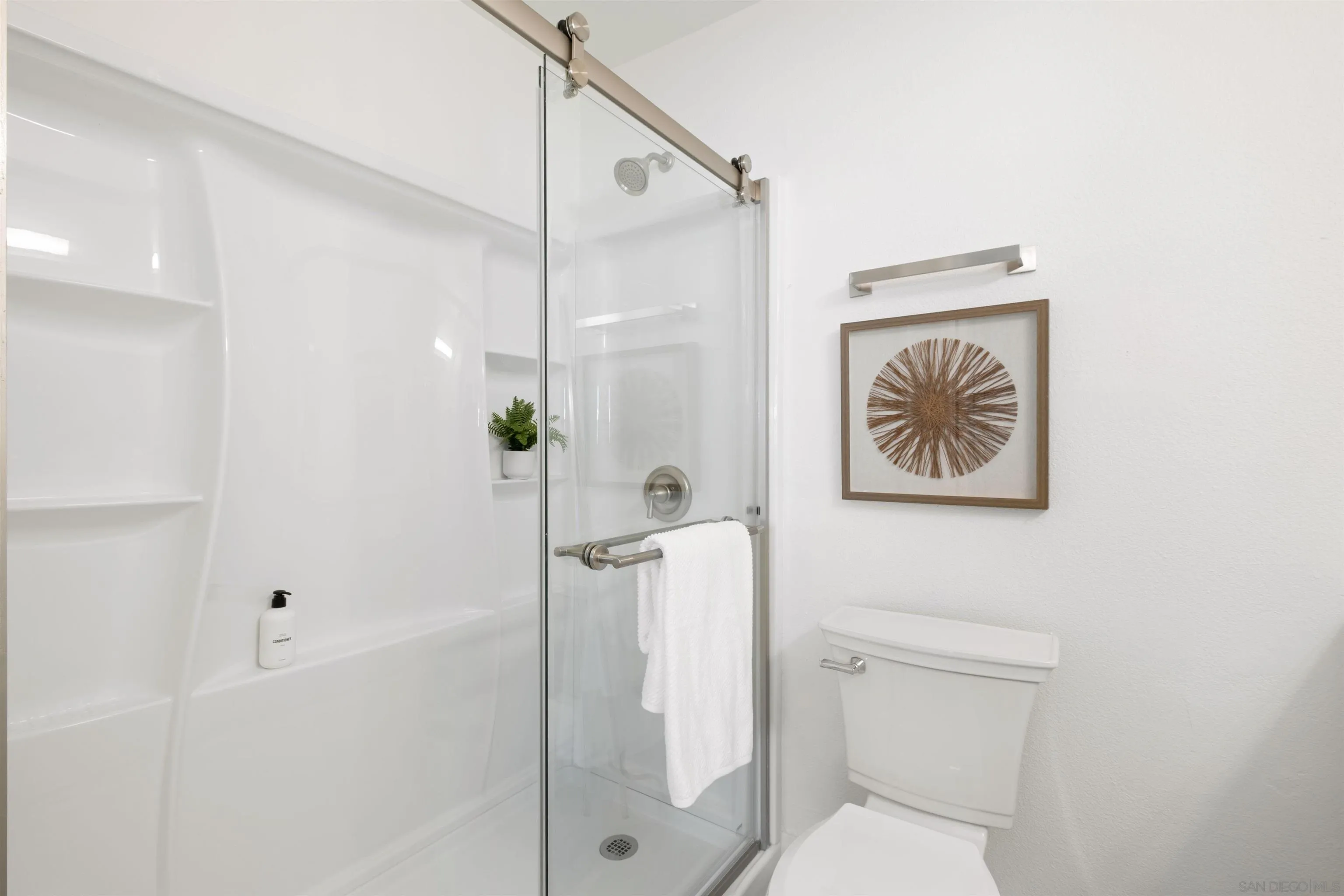 300 Roanoke Road, Unit 11 El Cajon, CA 92020 - Photo 18 of 28 a bathroom with a toilet and a shower