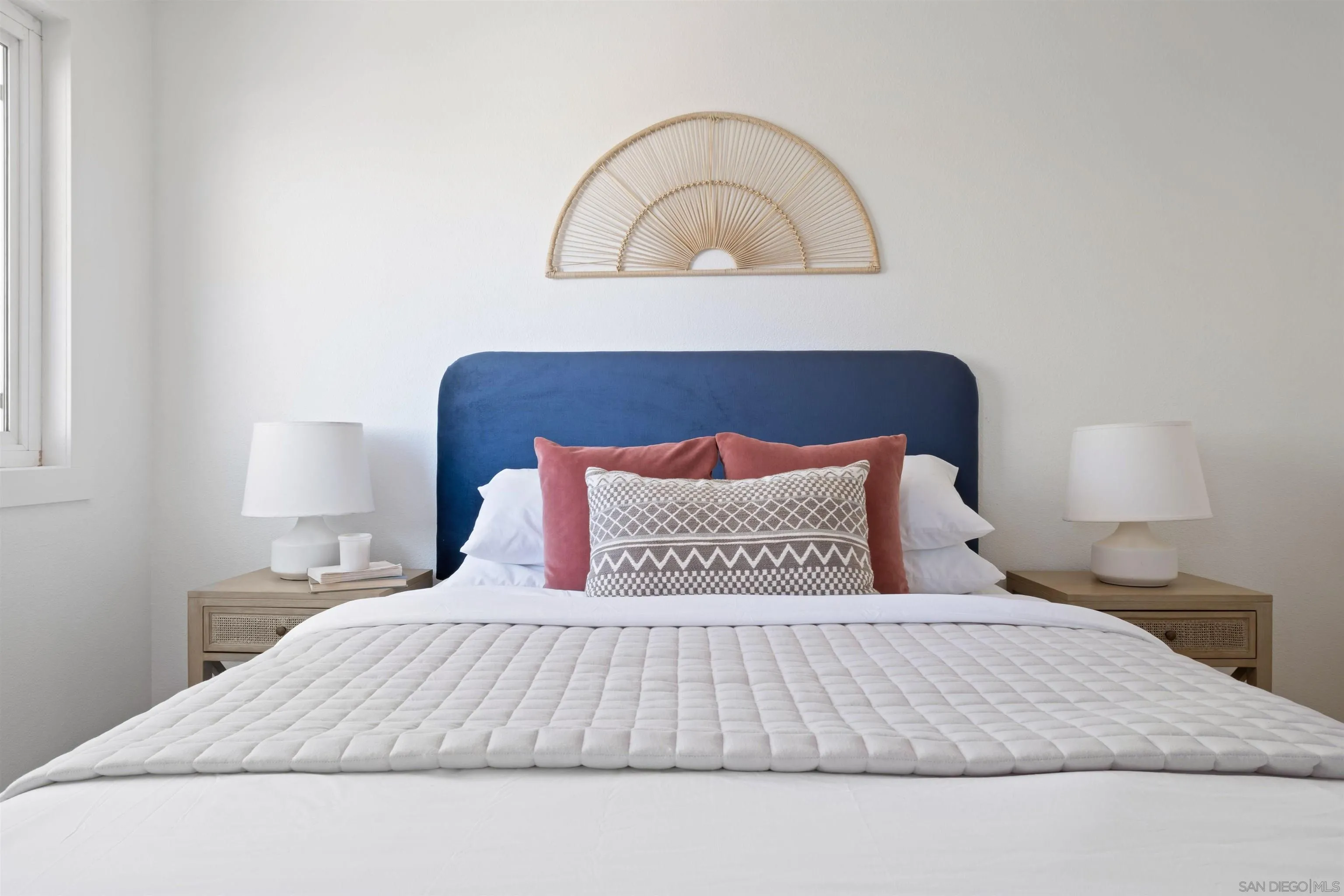 300 Roanoke Road, Unit 11 El Cajon, CA 92020 - Photo 20 of 28 a bedroom with a bed and a window