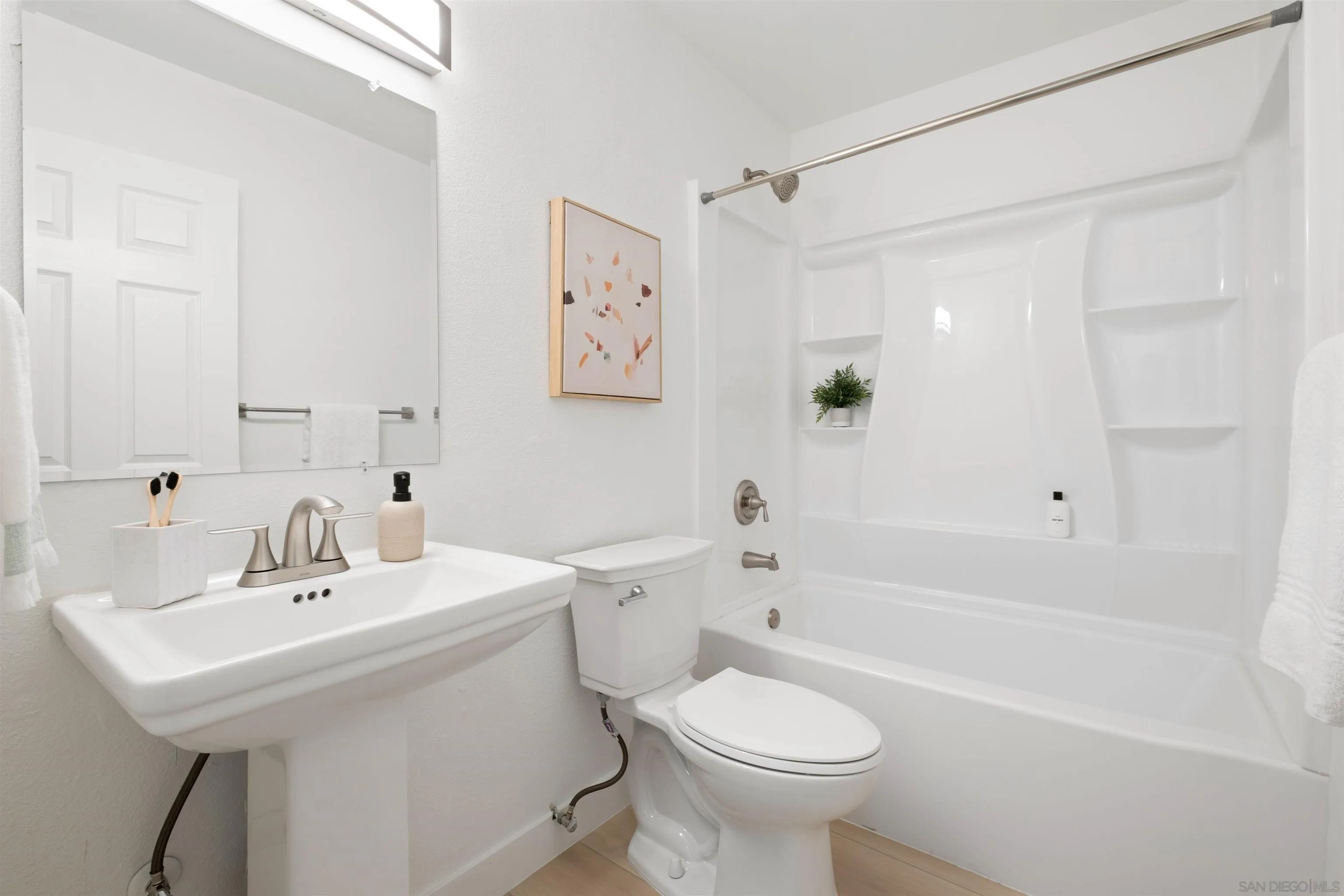 300 Roanoke Road, Unit 11 El Cajon, CA 92020 - Photo 22 of 28 a bathroom with a sink toilet and shower