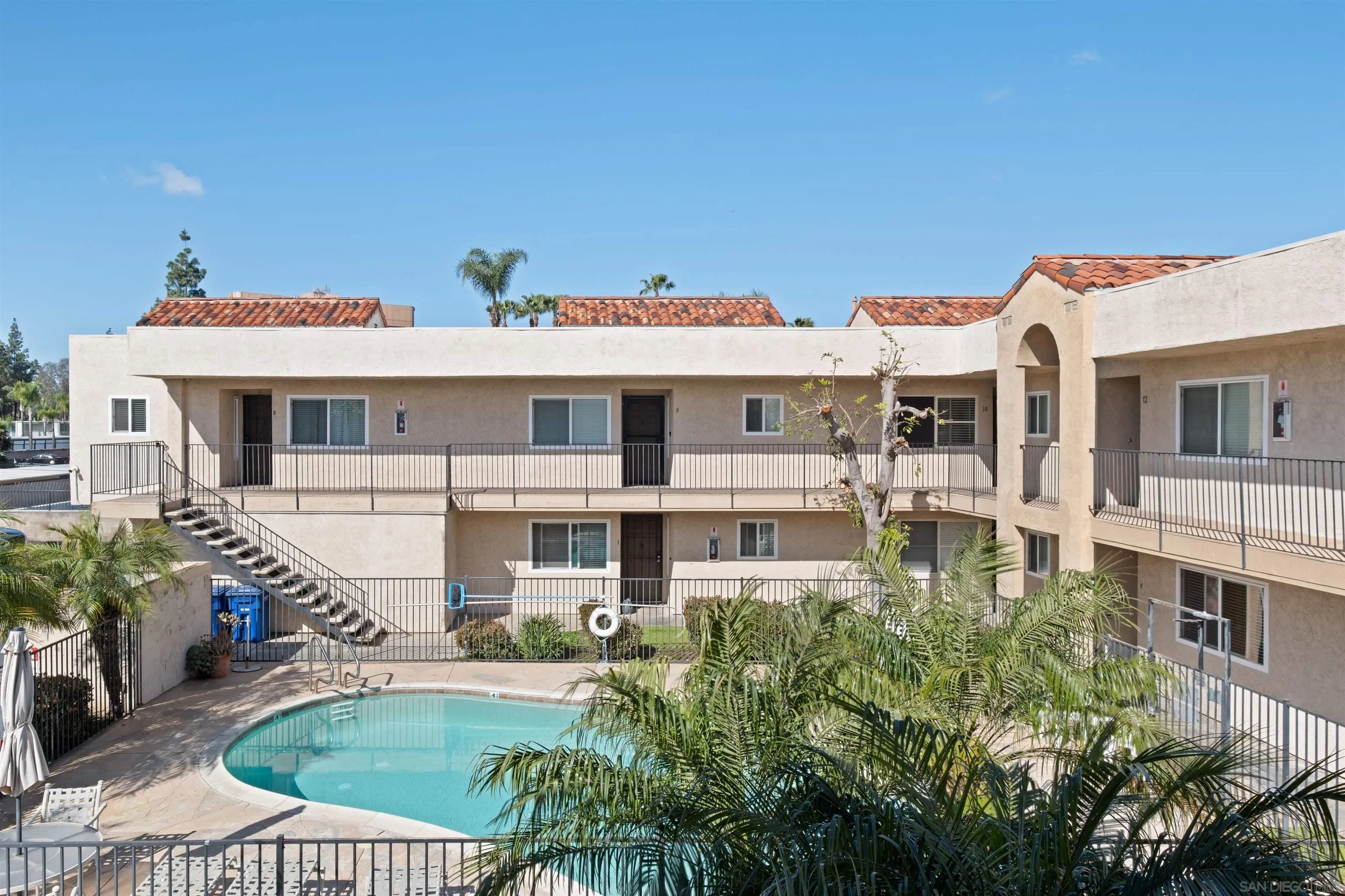 300 Roanoke Road, Unit 11 El Cajon, CA 92020 - Photo 24 of 28 a front view of a house with a yard