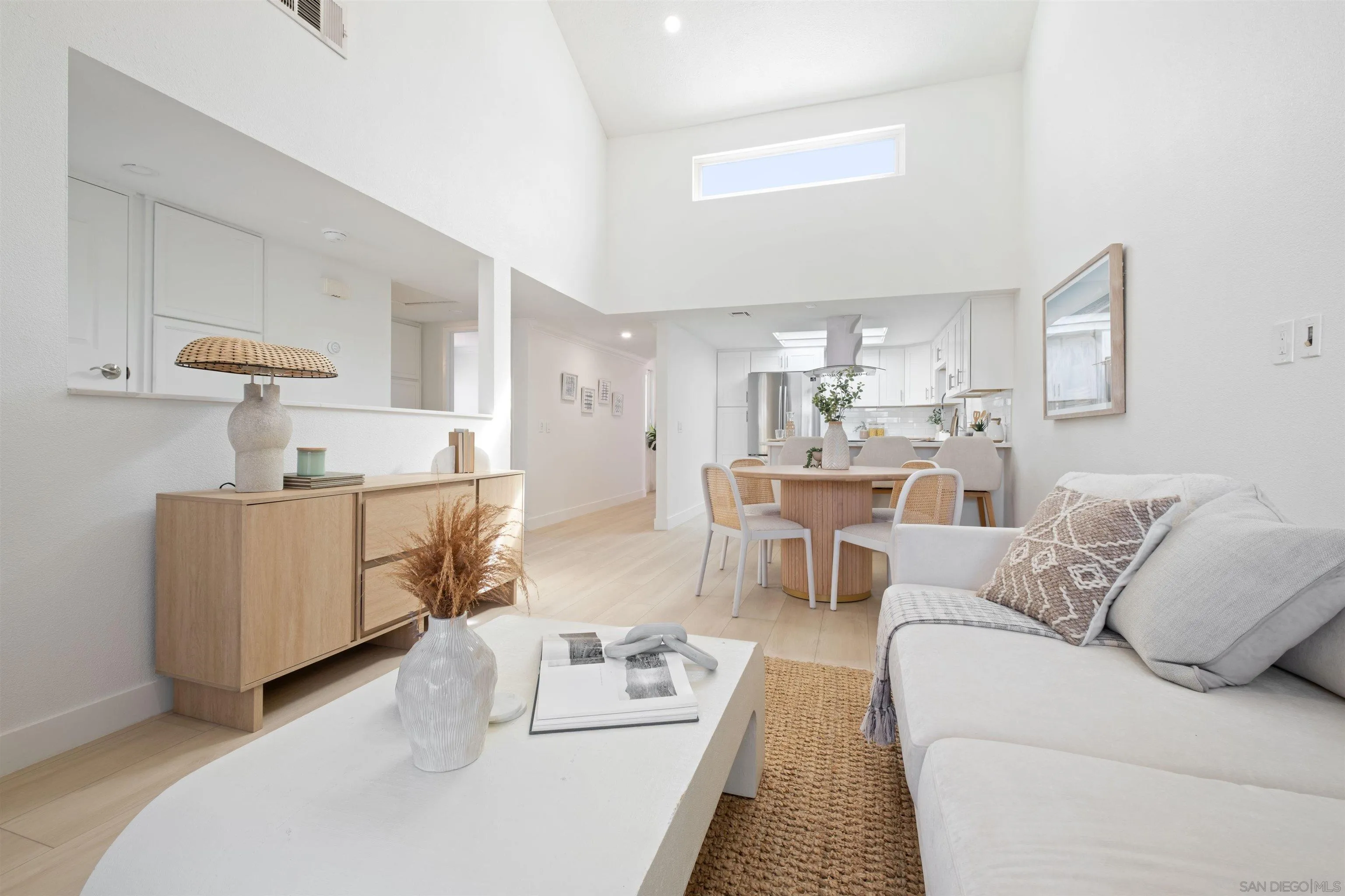 300 Roanoke Road, Unit 11 El Cajon, CA 92020 - Photo 4 of 28 a living room with furniture and a table