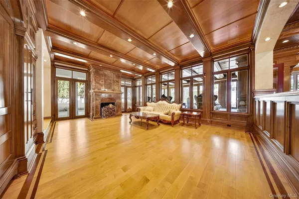 a very nice looking dining room with a large window