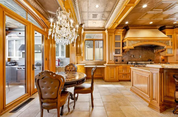 a view of entryway and hall with a door