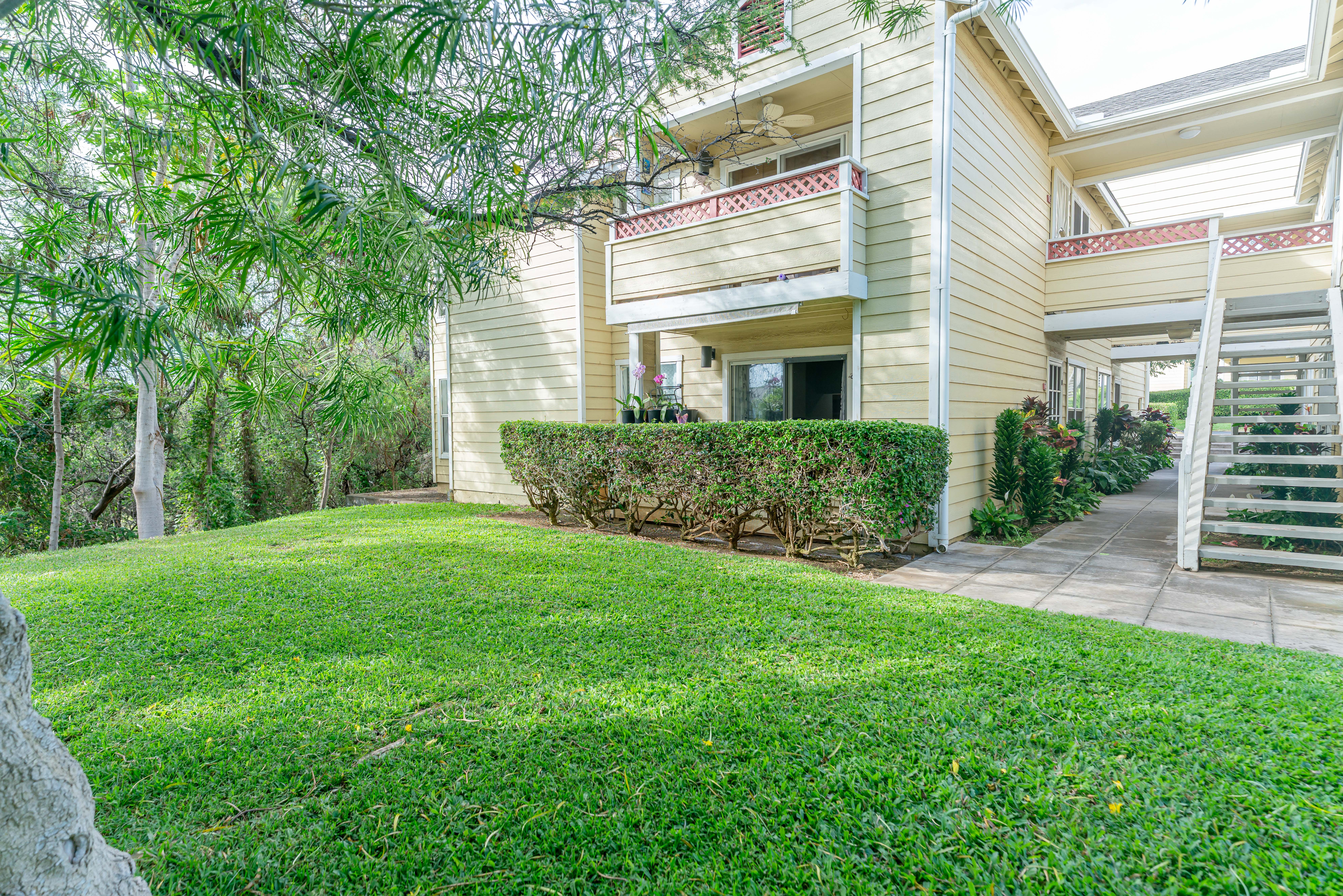 68-3831 Lua Kula Street, Unit L107 Waikoloa, HI 96738 - Photo 11 of 17 a view of backyard of house with green space
