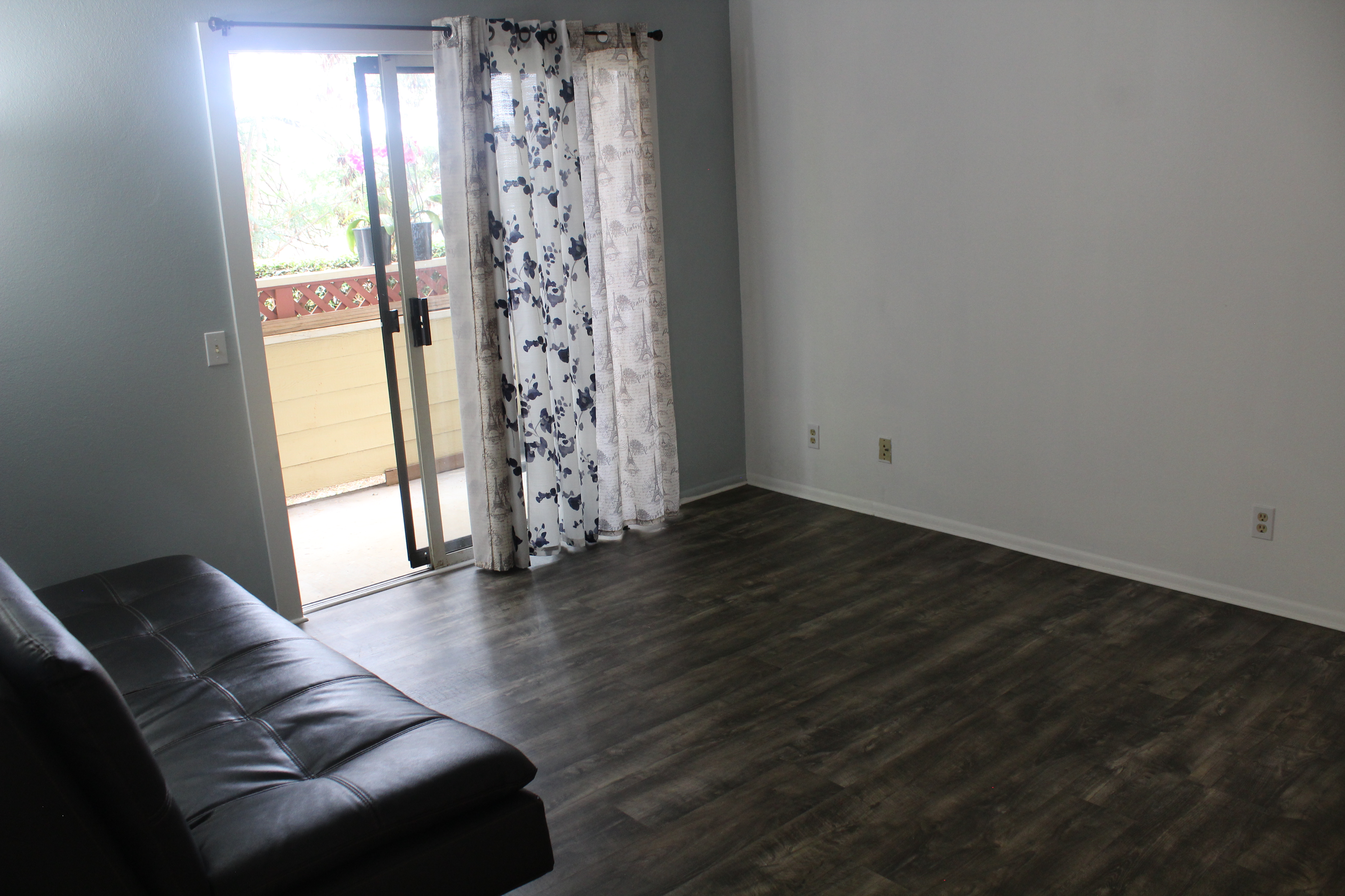 68-3831 Lua Kula Street, Unit L107 Waikoloa, HI 96738 - Photo 16 of 17 a living room with furniture and a floor to ceiling window