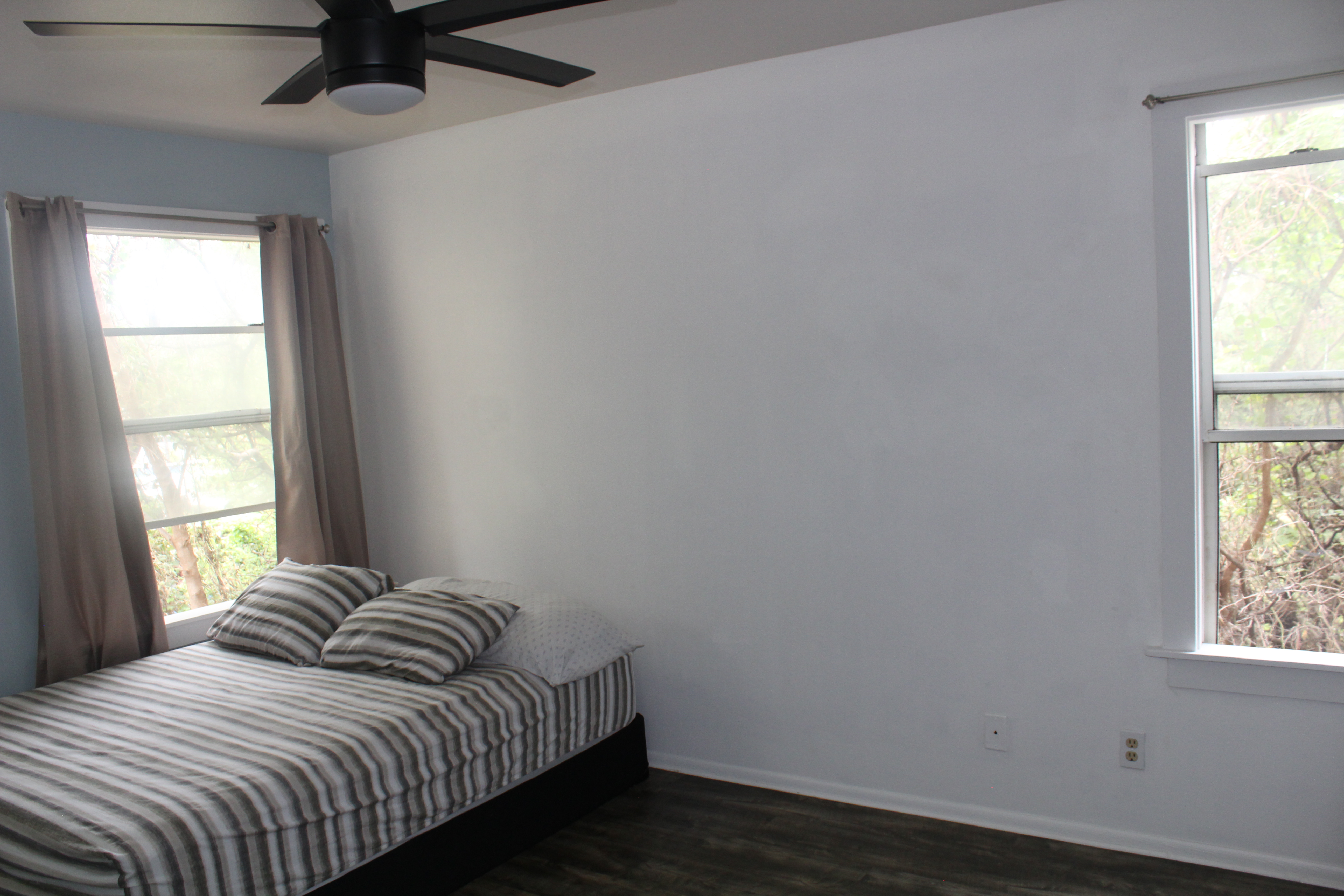 68-3831 Lua Kula Street, Unit L107 Waikoloa, HI 96738 - Photo 17 of 17 a bedroom with a bed and a window