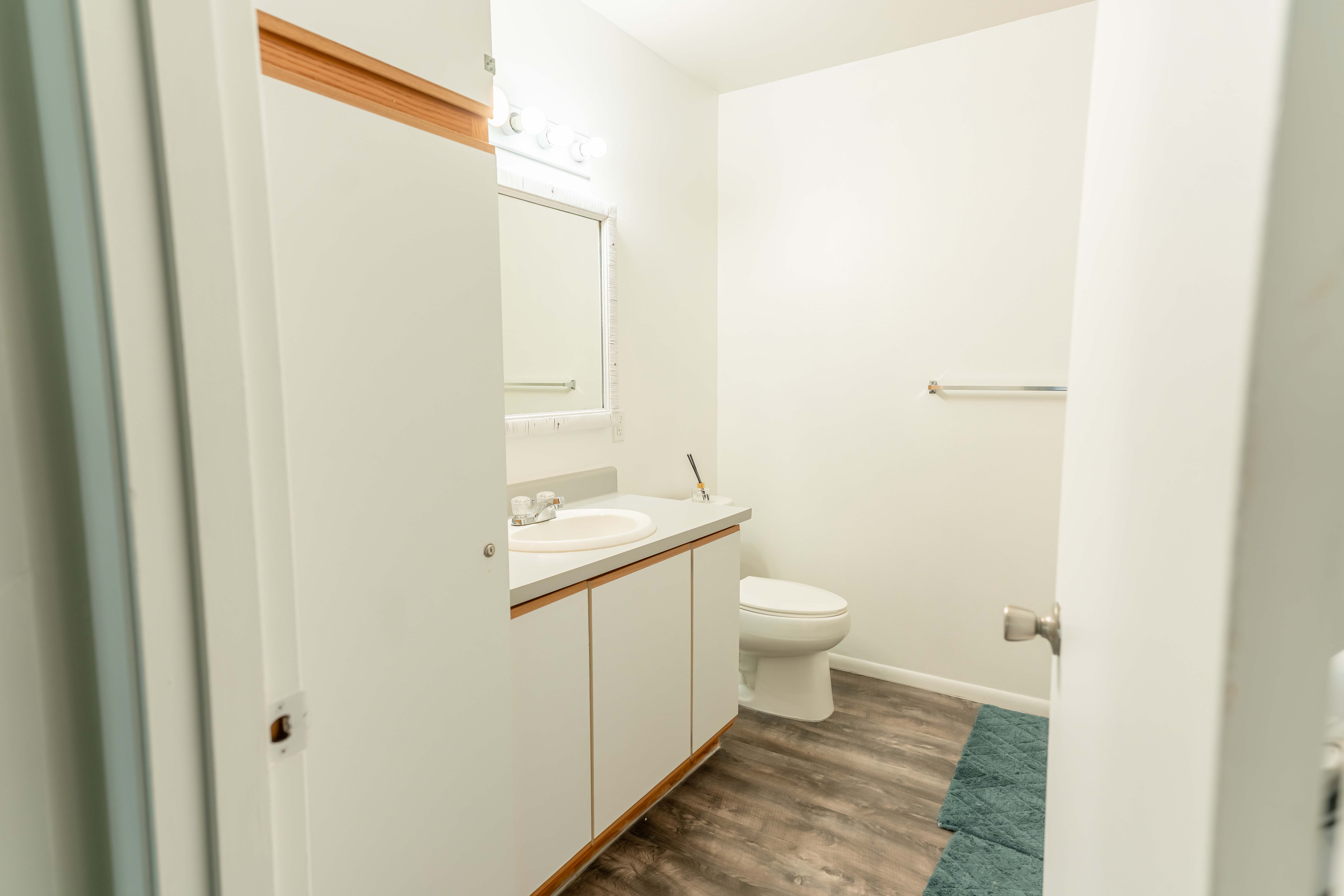 68-3831 Lua Kula Street, Unit L107 Waikoloa, HI 96738 - Photo 8 of 17 a bathroom with a sink a toilet and shower