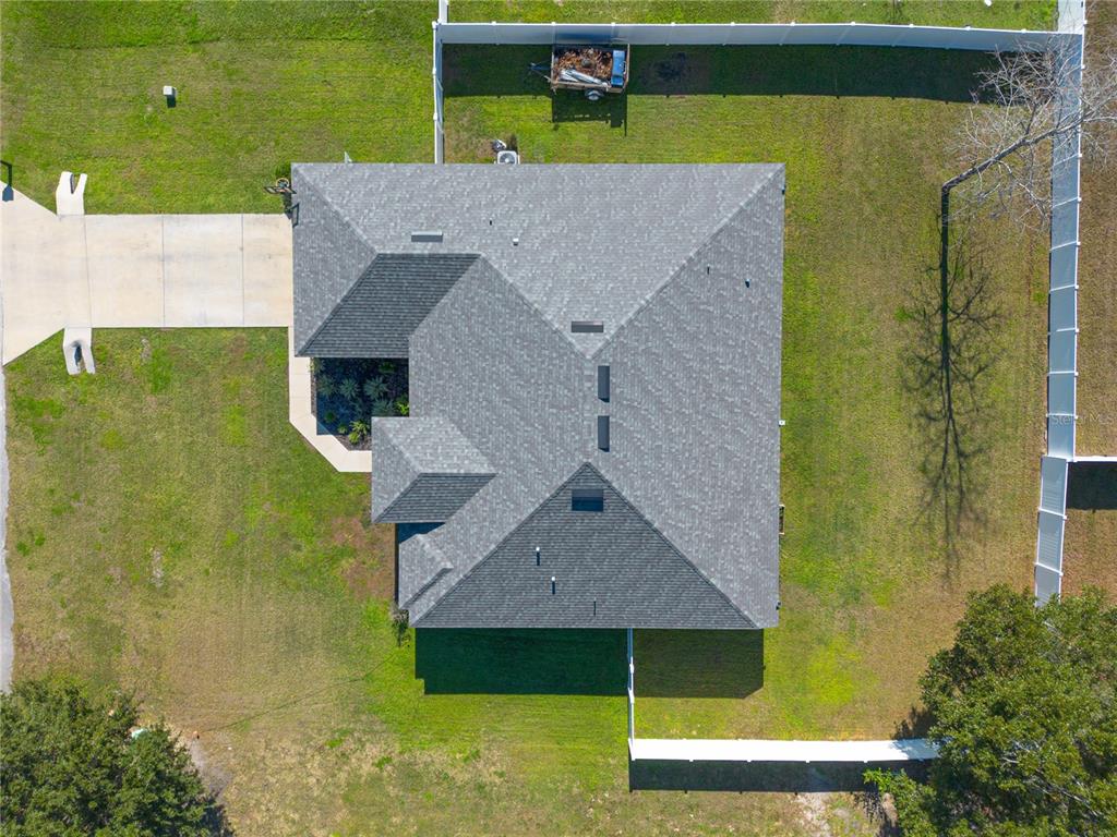 10170 Southwest 78th Court Ocala, FL 34476 - Photo 38 of 43 an aerial view of a house with a swimming pool