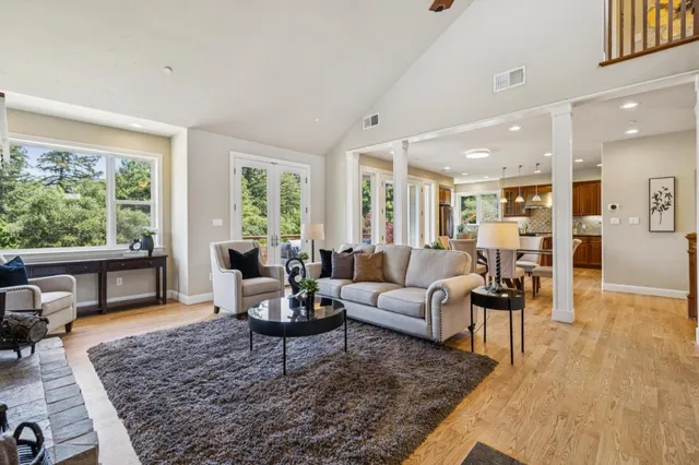 a kitchen with stainless steel appliances granite countertop a stove and a sink