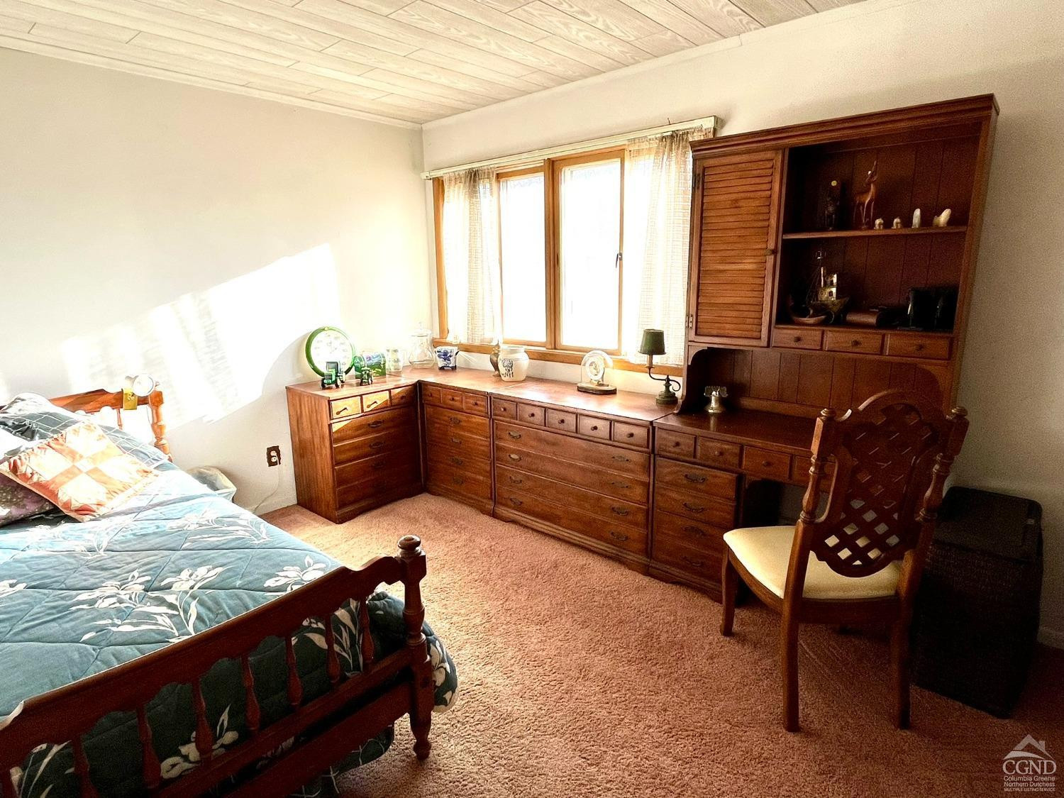 375 Church Road Hudson, NY 12534 - Photo 11 of 15 a bed room with a bed and a chair