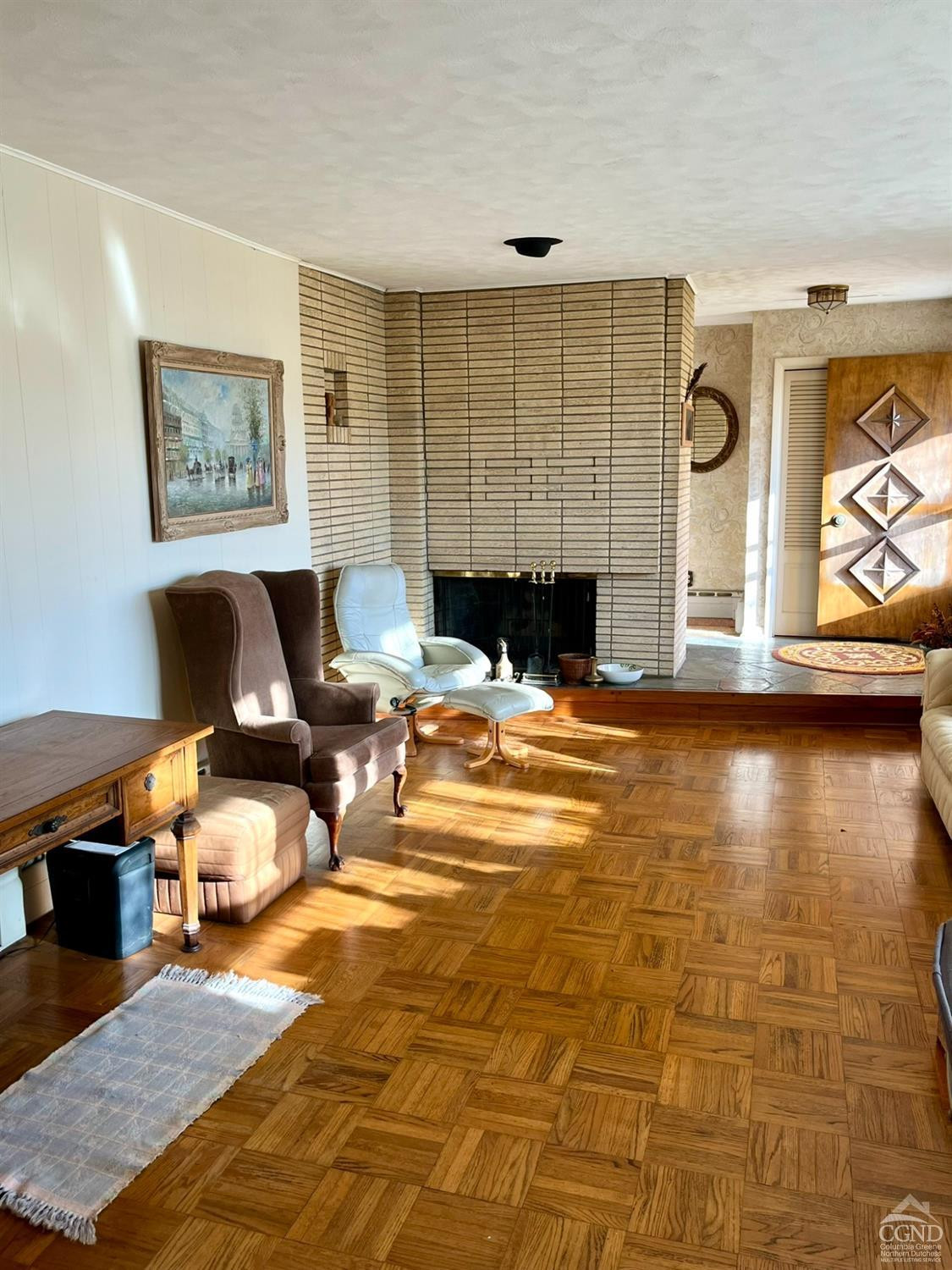 375 Church Road Hudson, NY 12534 - Photo 8 of 15 a living room with fireplace furniture and a flat screen tv