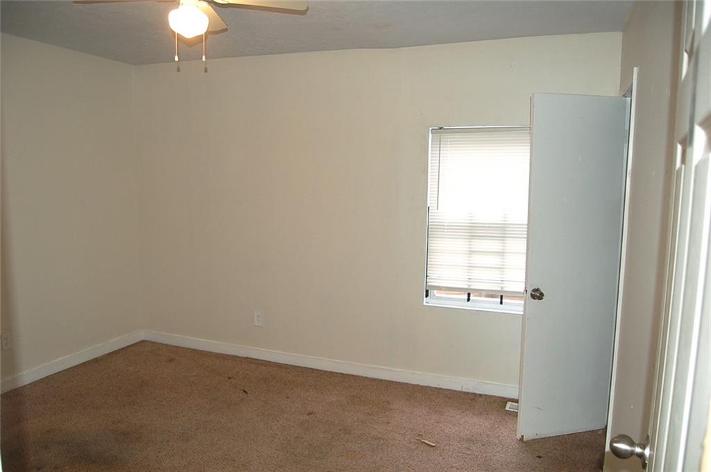 856 Beckwith Street Southwest Atlanta, GA 30314 - Photo 12 of 19 an empty room with a window