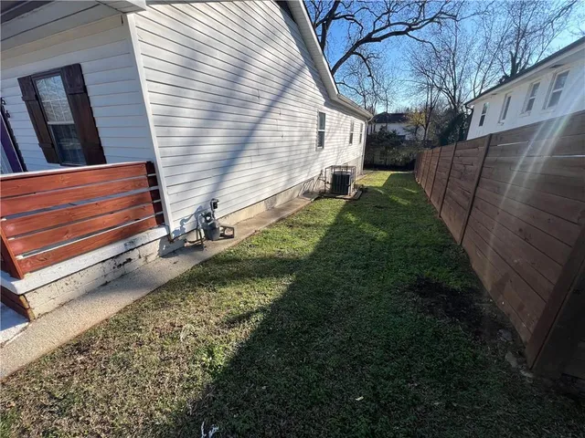 a view of backyard with cabin
