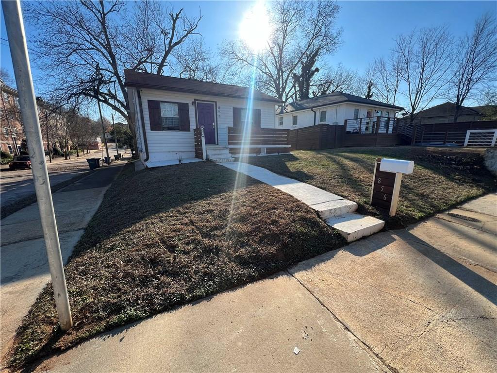 856 Beckwith Street Southwest Atlanta, GA 30314 - Photo 3 of 19 a view of a yard with a large tree