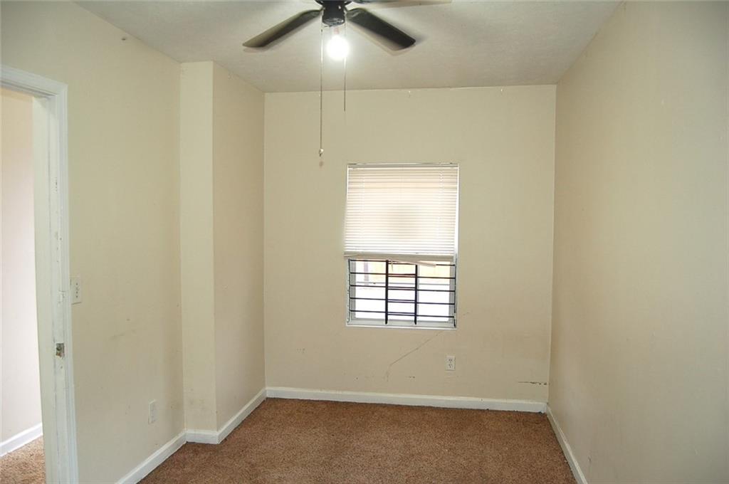 856 Beckwith Street Southwest Atlanta, GA 30314 - Photo 8 of 19 an empty room with a window