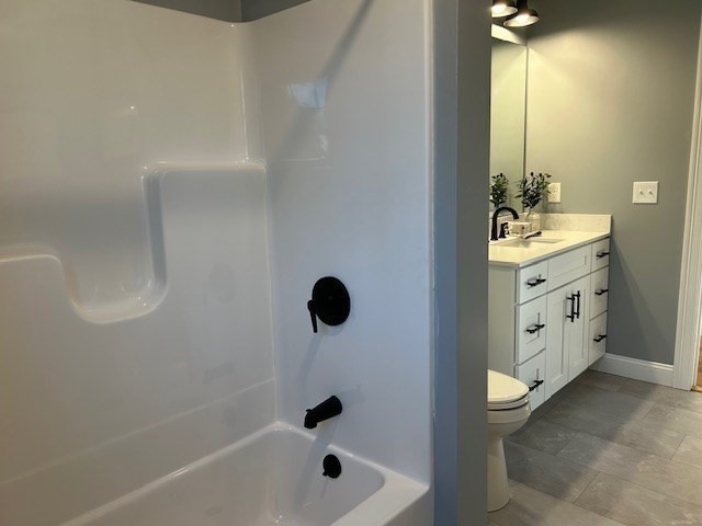 611 Prospect Street Methuen, MA 01844 - Photo 22 of 25 a bathroom with a sink a toilet and shower