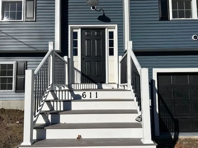 a view of entryway with a front door