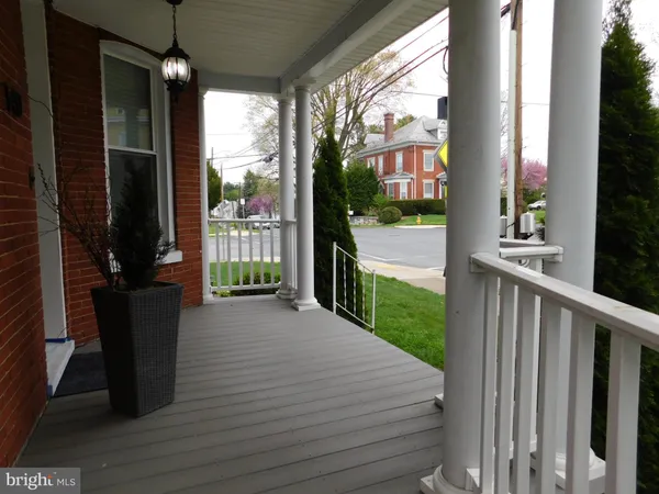 a porch with seating space