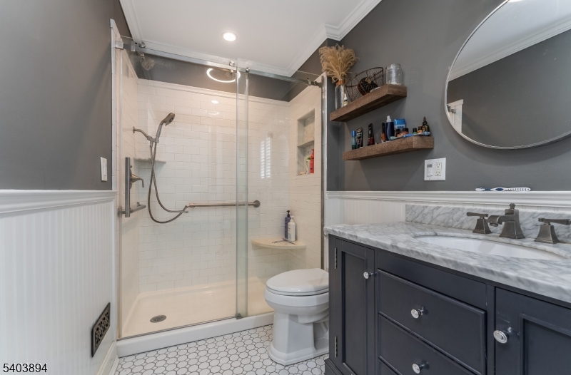 18 Sanatorium Road Glen Gardner, NJ 08826 - Photo 24 of 31 a bathroom with a granite countertop sink a toilet and shower