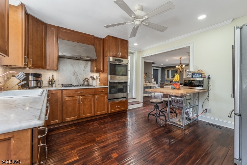 18 Sanatorium Road Glen Gardner, NJ 08826 - Photo 8 of 31 a kitchen with a sink cabinets and wooden floor