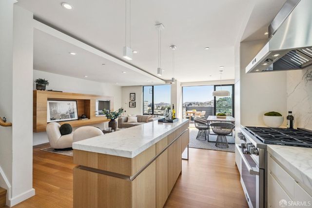 a view of a living room and dining room