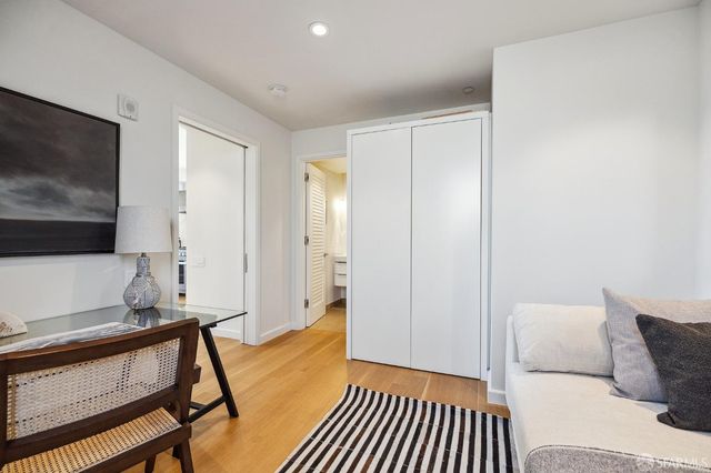 a living room with a couch and a flat screen tv