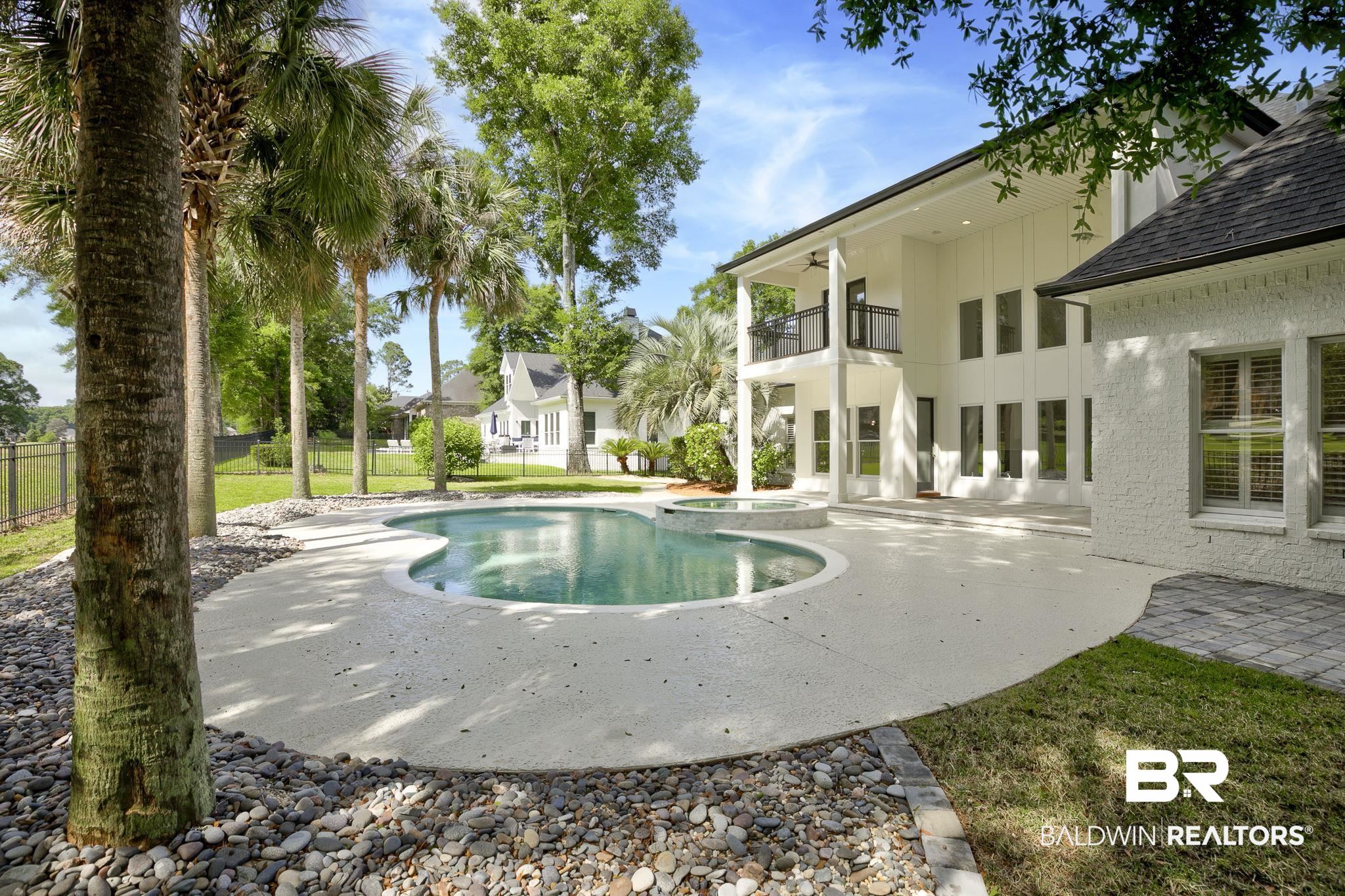 105 High Pines Ridge Fairhope, AL 36532 - Photo 27 of 97 View of pool with a patio and a pool with connected hot tub