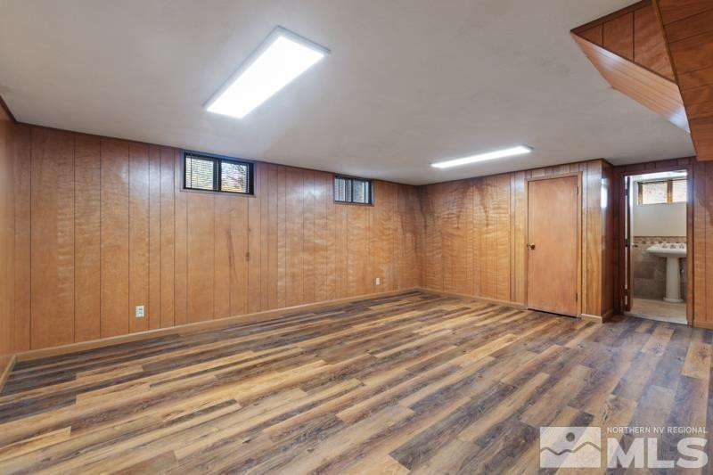 2250 Foothill Road Reno, NV 89511 - Photo 20 of 37 a view of an empty room with wooden floor and a window