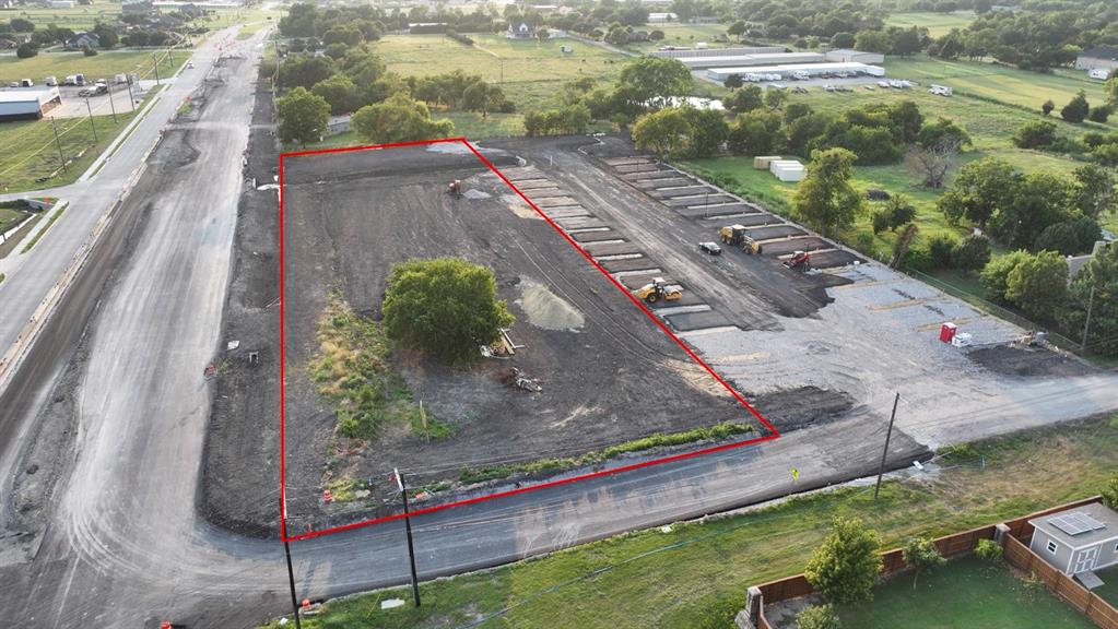 2725 Aztec Trail Wylie, TX 75098 - Photo 2 of 3 a view of a lake with a yard