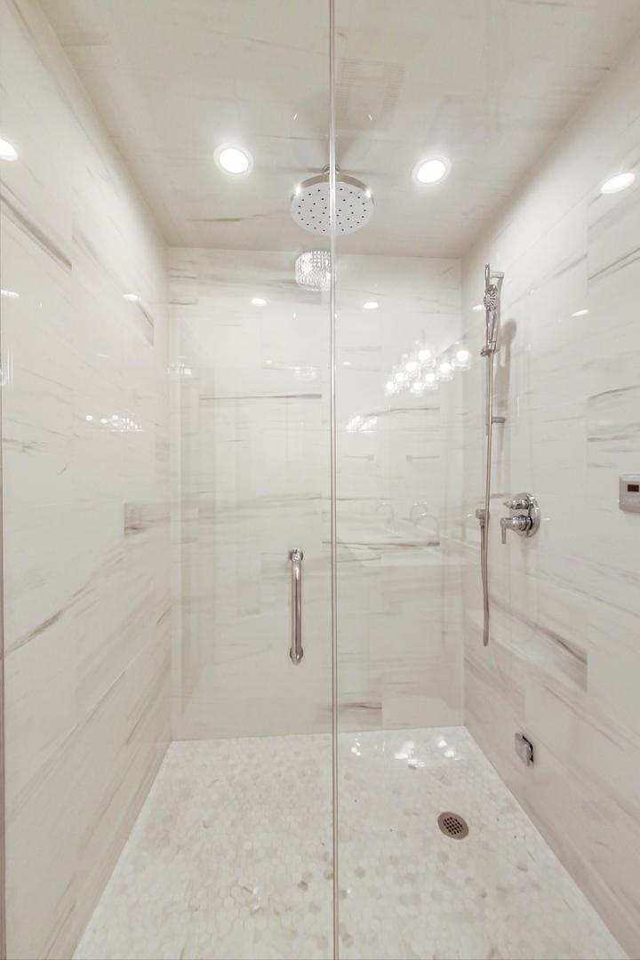 4311 North Western Avenue, Unit 1 Chicago, IL 60618 - Photo 11 of 18 a bathroom with a shower