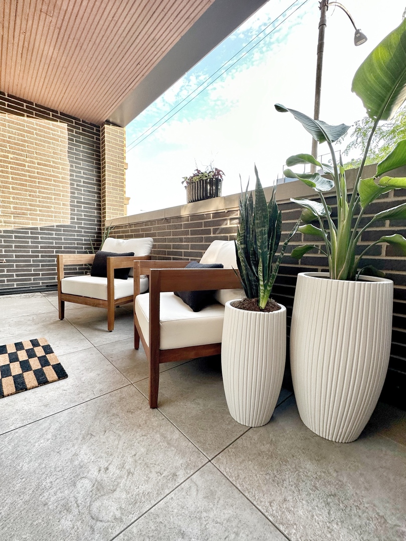 4311 North Western Avenue, Unit 1 Chicago, IL 60618 - Photo 16 of 18 a view of porch with seating space