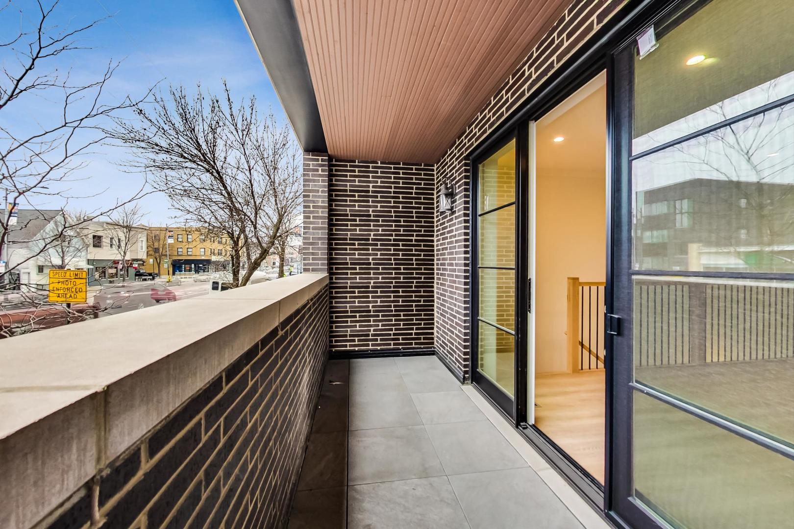 4311 North Western Avenue, Unit 1 Chicago, IL 60618 - Photo 17 of 18 a view of balcony with stainless steel appliances