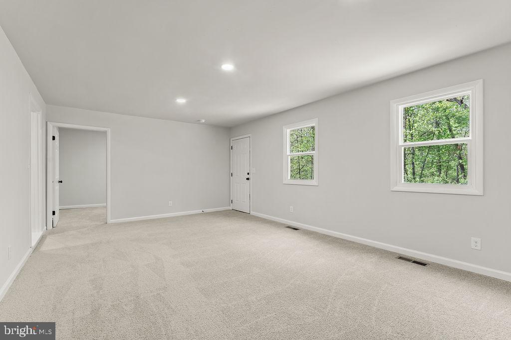 28494 Eddings Road Rhoadesville, VA 22542 - Photo 7 of 32 an empty room with windows