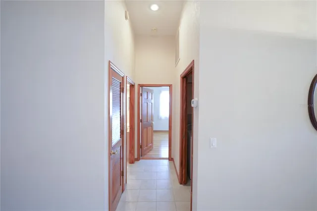 a view of a hallway with windows