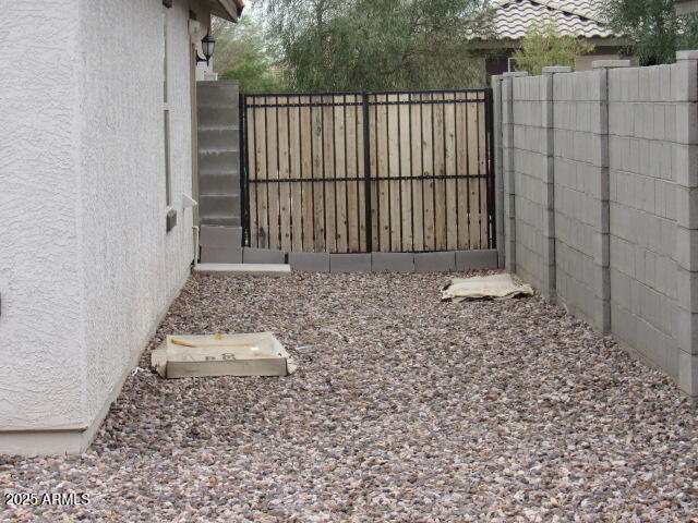 17164 West Straight Arrow Lane Surprise, AZ 85387 - Photo 20 of 39 a view of a backyard