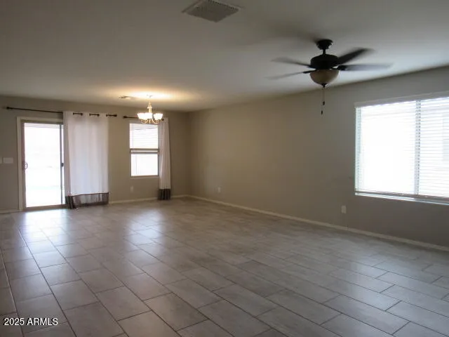 a view of a backyard of the house