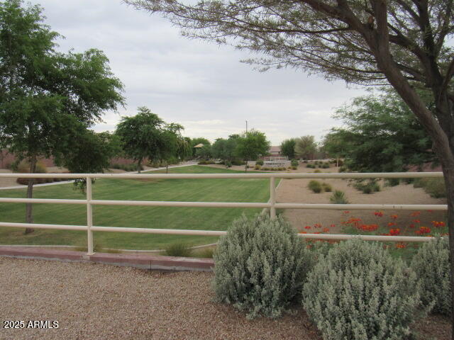 17164 West Straight Arrow Lane Surprise, AZ 85387 - Photo 39 of 39 a view of a golf course with a lake