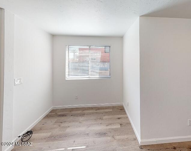 2118 North Rita Avenue Tucson, AZ 85716 - Photo 8 of 17 an empty room with a window